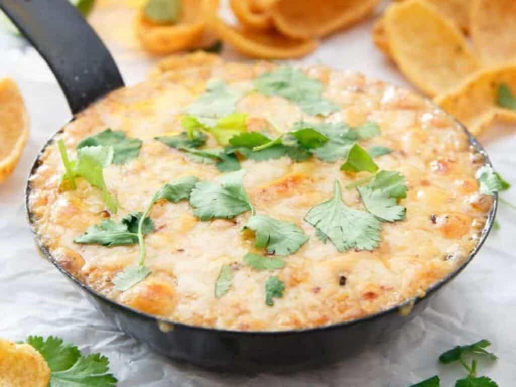 Image shows easy to make cheesy chipotle fundido dip.