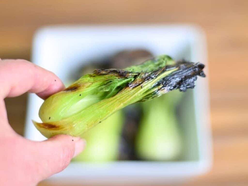 Image shows easy to make grilled baby bok choy.