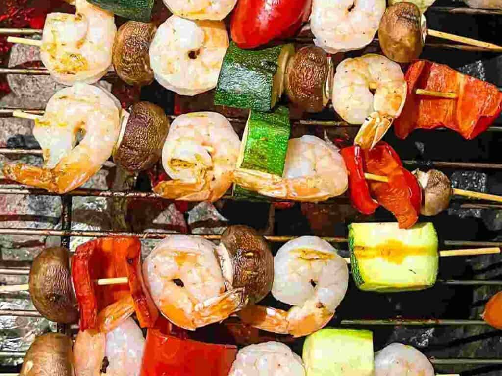 Image shows irresistible grilled shrimp skewers.