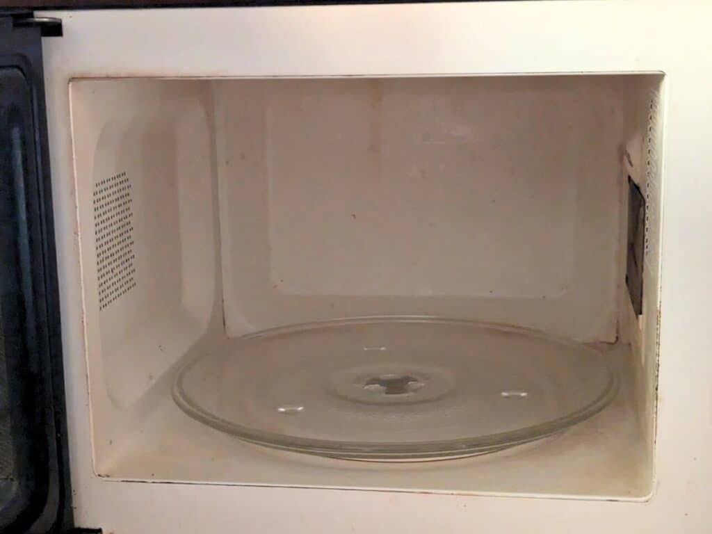 Image shows a Clean microwave from the inside.