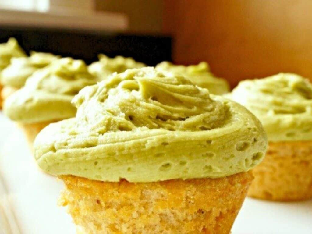 Image shows easy to make green tea cupcakes with matcha frosting.