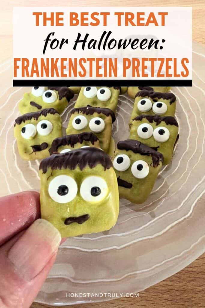 Image shows a Hand holding a Frankenstein pretzel with text the best treat for Halloween: frankenstein pretzels.
