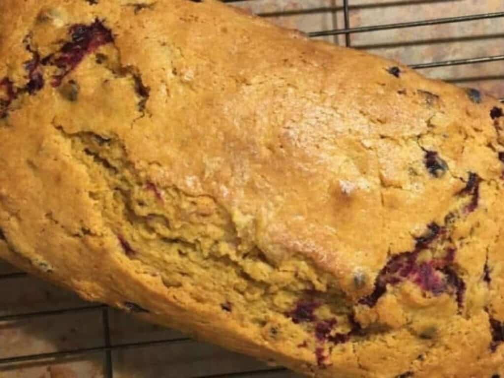 Image shows delicious cranberry orange graham loaf.