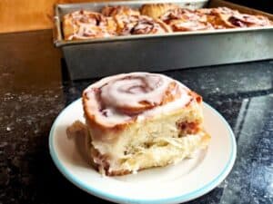 Image shows irresistible cherry cinnamon roll.