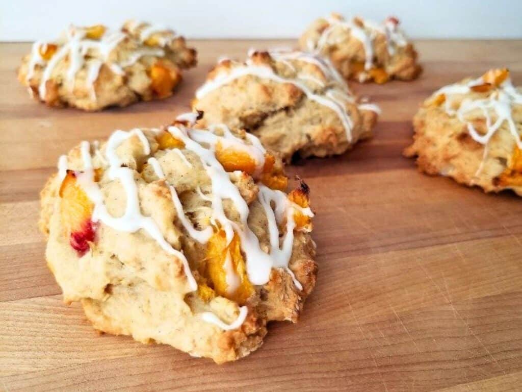 Image shows irresistible peach scones.