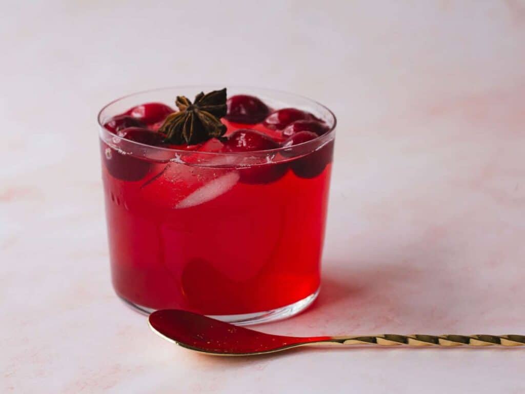 Image shows irresistible spiced cranberry juice.