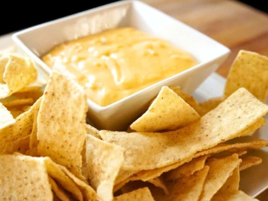 Image shows ready to dip nacho cheese recipe.