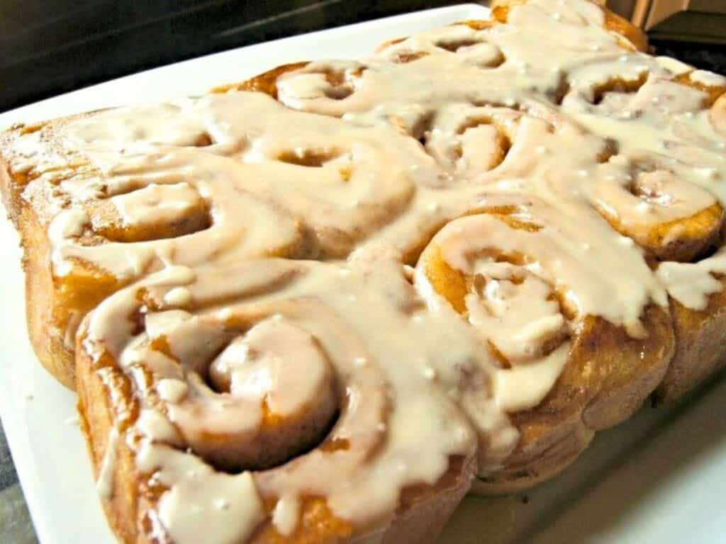 Image shows vanilla chai tea cinnamon rolls recipe.