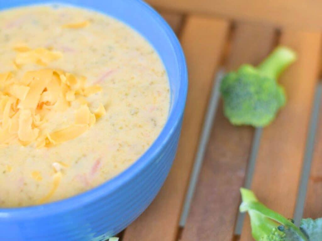 Image shows delicious Instant Pot broccoli cheddar soup recipe.