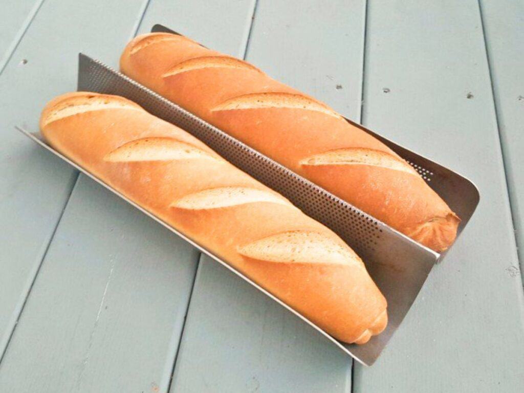 Image shows easy to make homemade French baguettes.