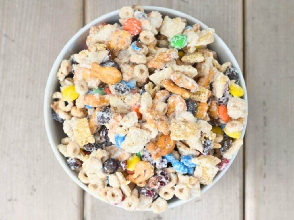 Image shows easy to make white chocolate party mix.