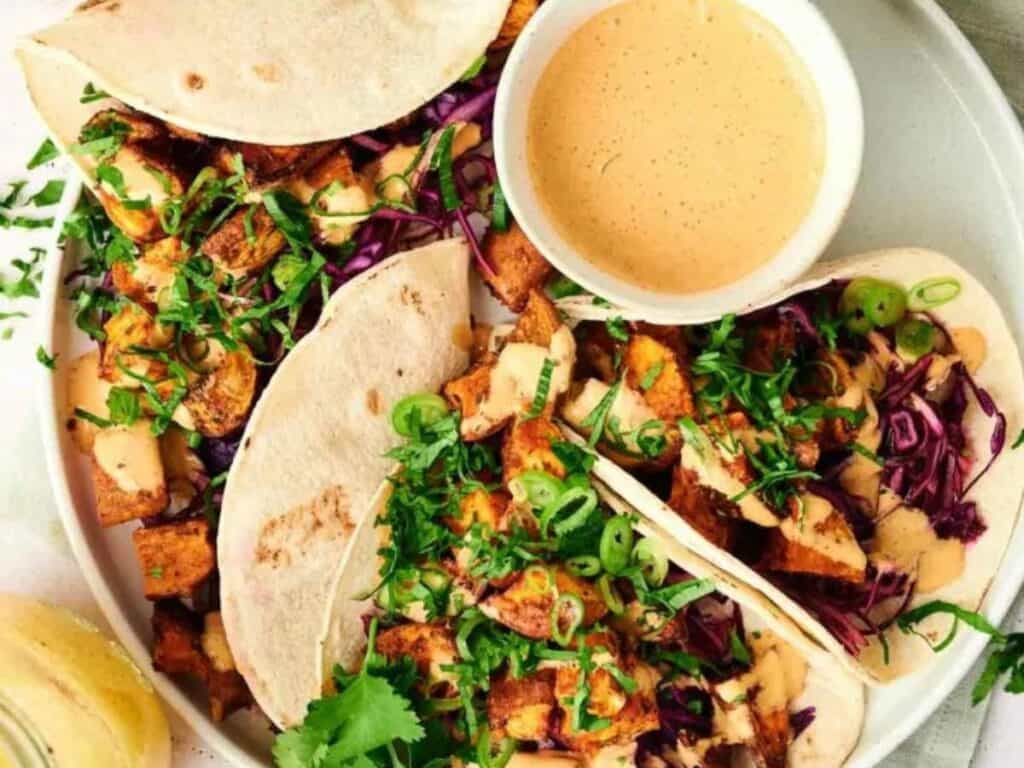 Image shows irresistible sweet potato tacos.