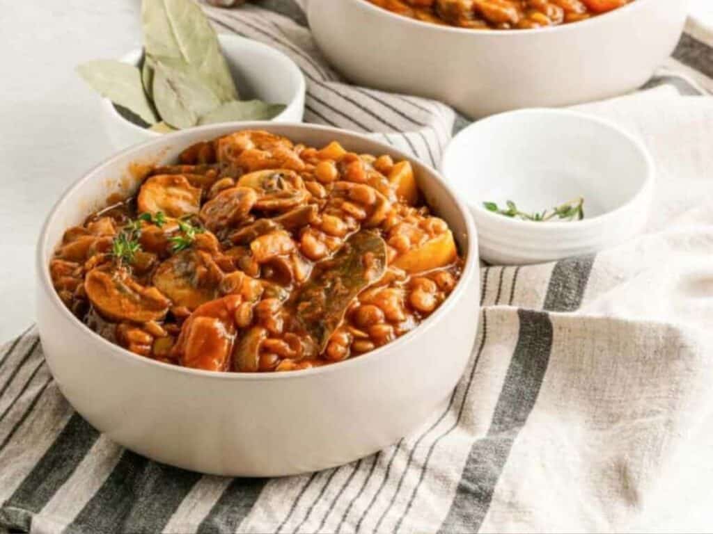 Image shows irresistible vegan mushroom lentil stew.
