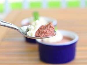 Image shows bite of yummy cherry bavarian custard.