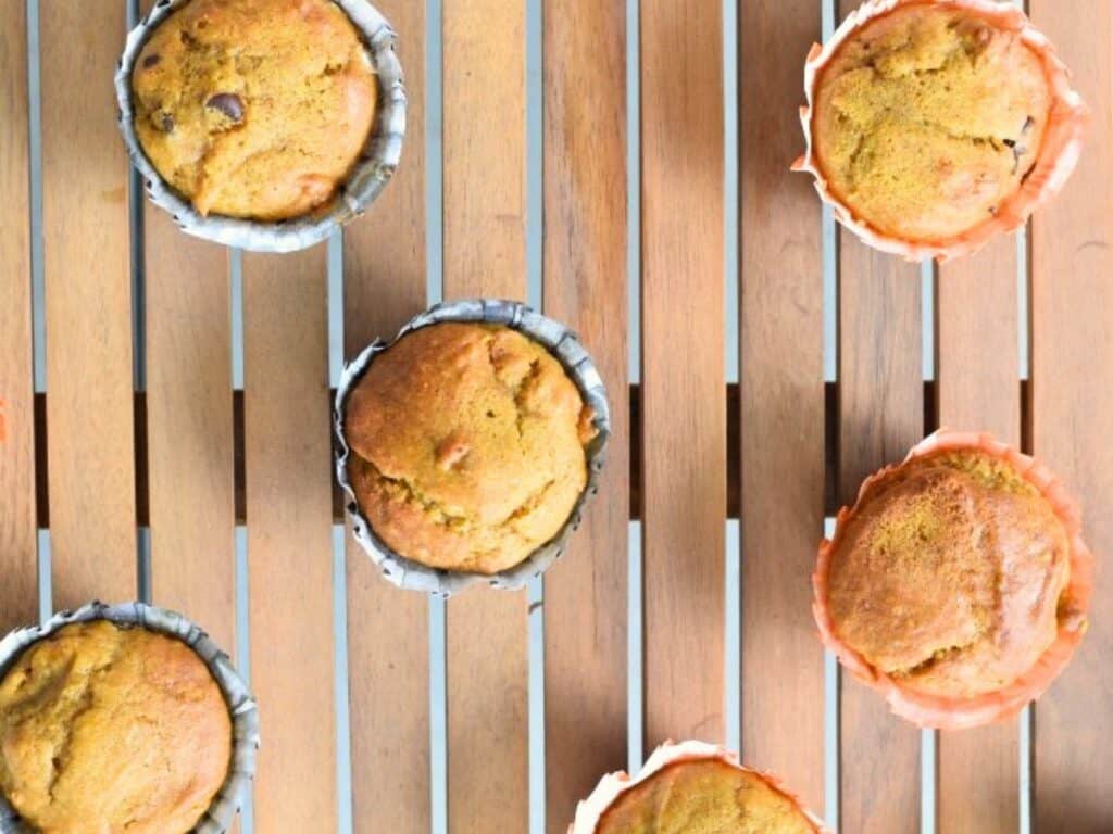 Image shows chocolate chip pumpkin muffins recipe.