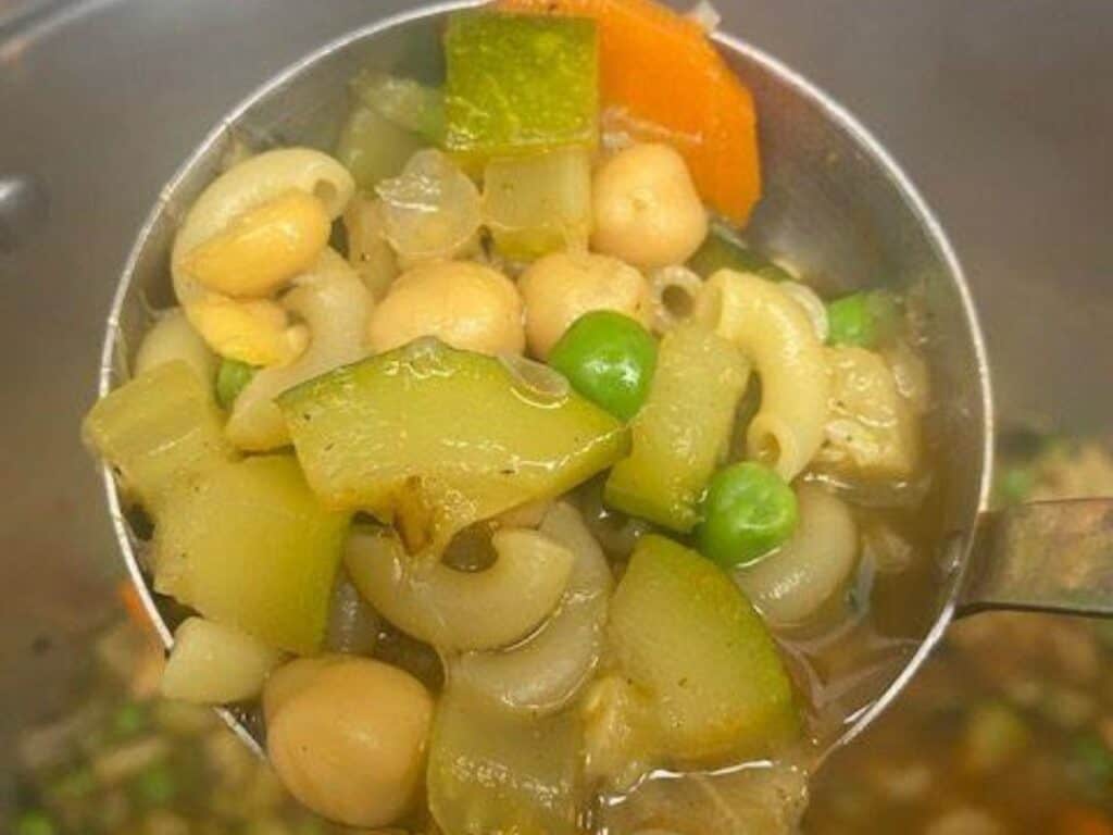 Image shows delicious and classic minestrone soup.