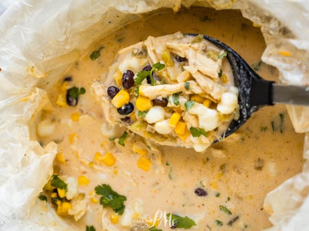 Image shows delicious creamy chicken hominy soup.