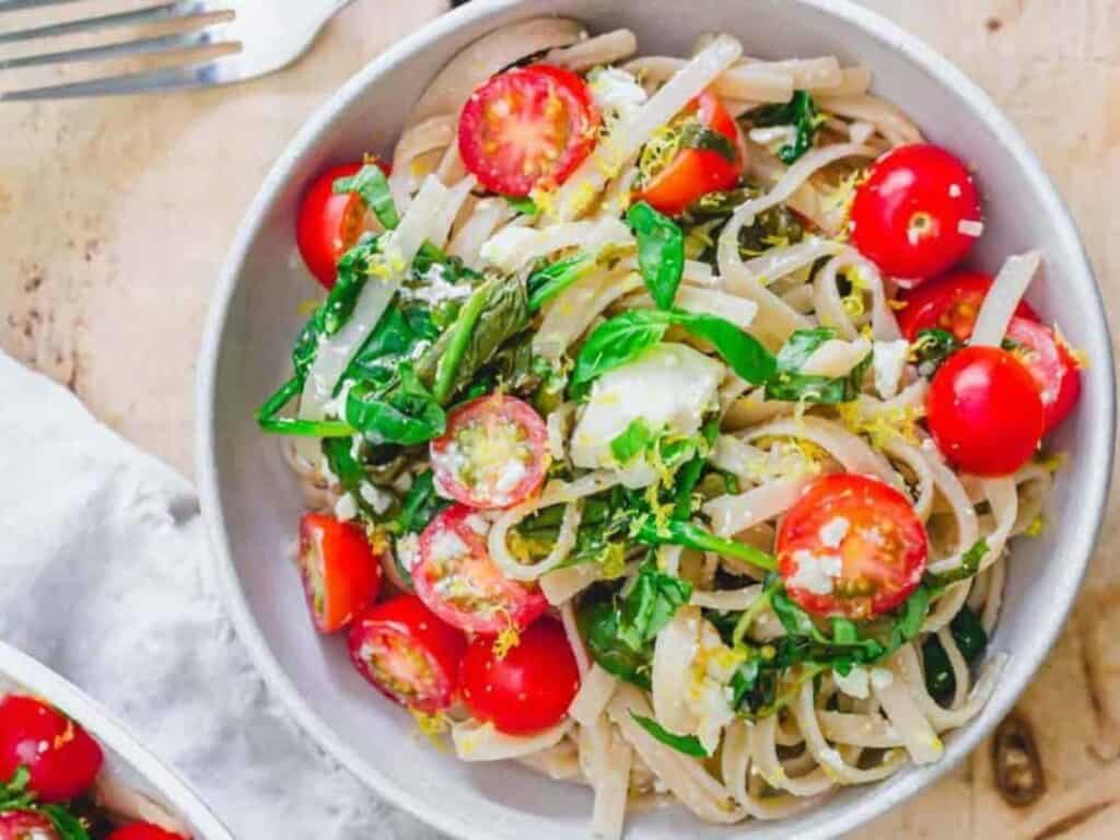 Image shows easy to make lemon feta spinach pasta.