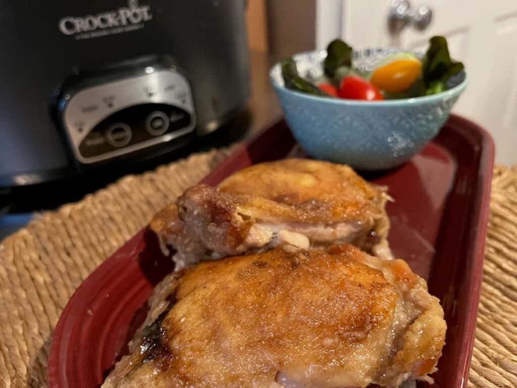 Image shows fried chicken in the crock pot recipe.