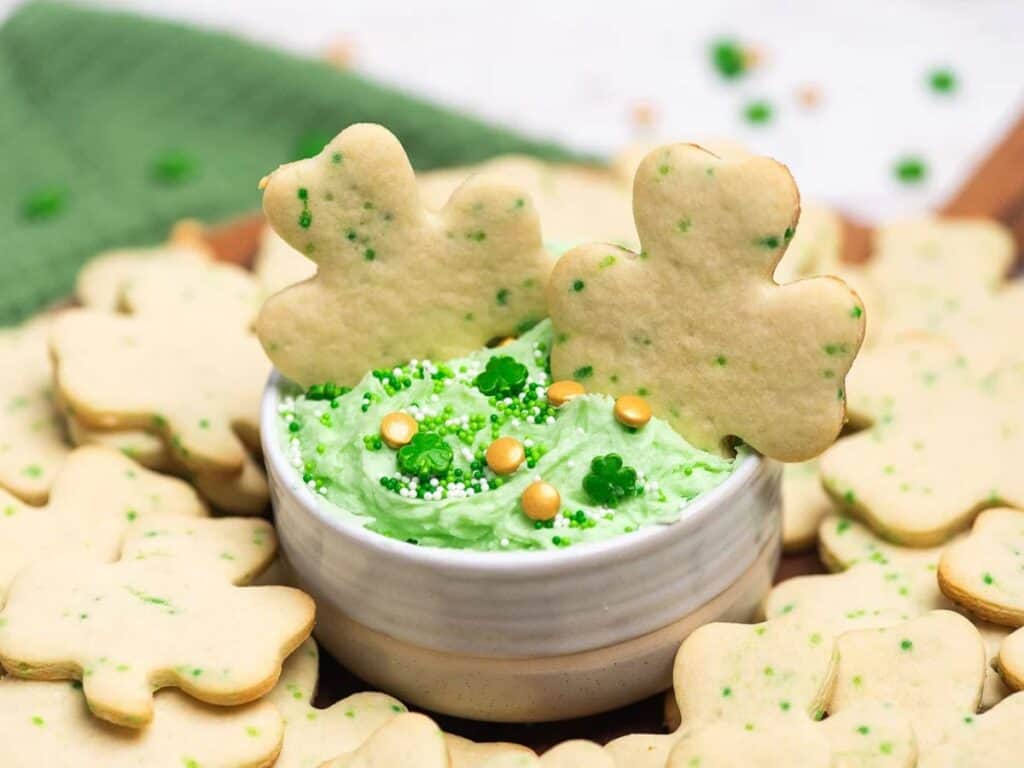 Image shows irresistible St. Patrick’s cookies and dip.