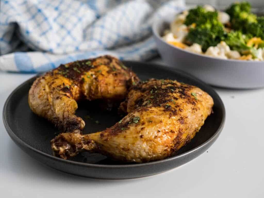 Image shows delicious air fryer chicken leg quarters.