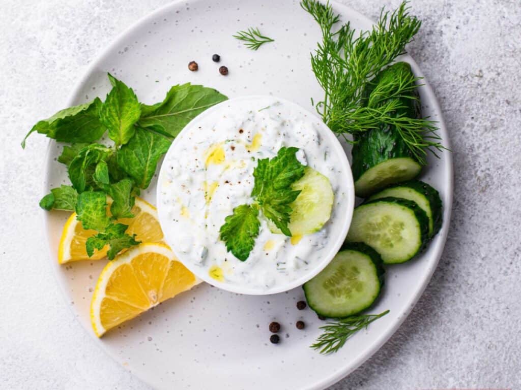 Image shows delicious and creamy tzatziki sauce.