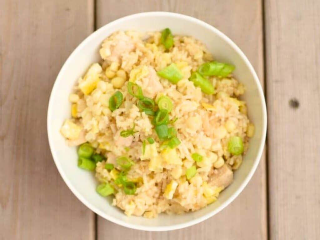 Image shows homemade chicken fried rice recipe.