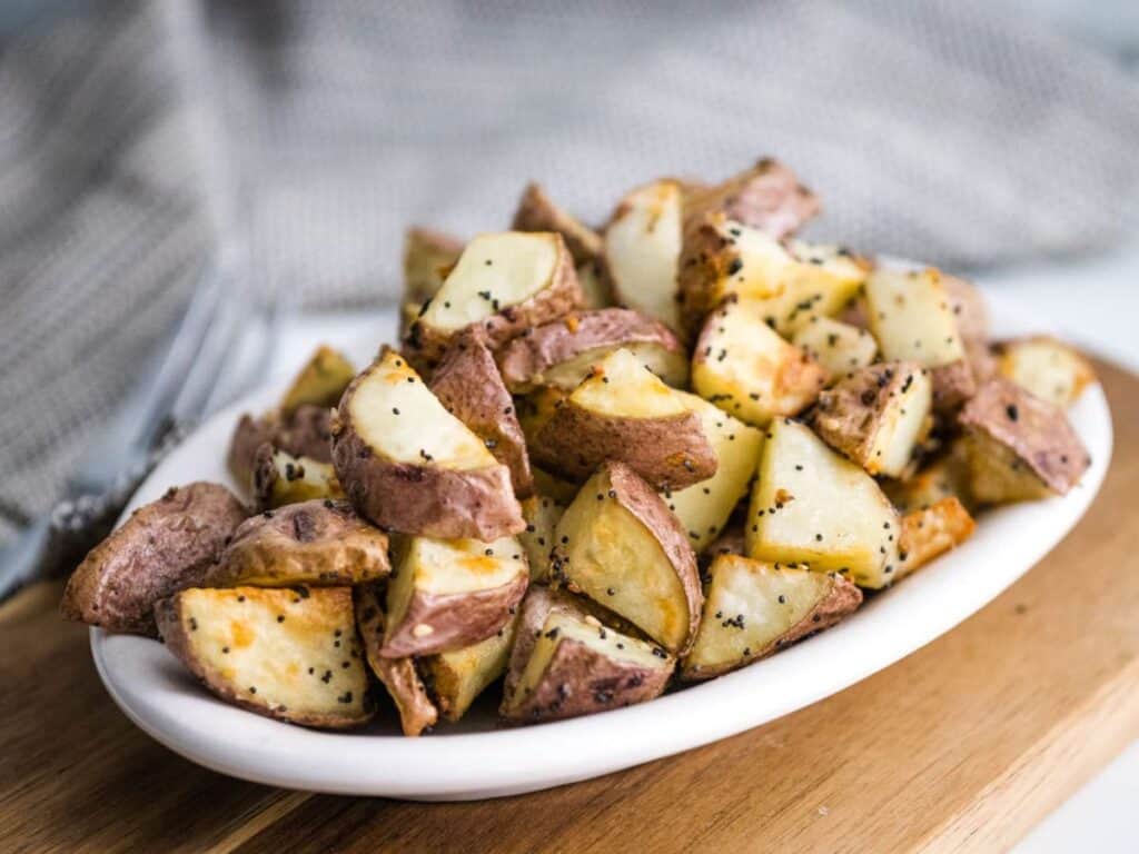 Image shows irresistible air fryer red potatoes.