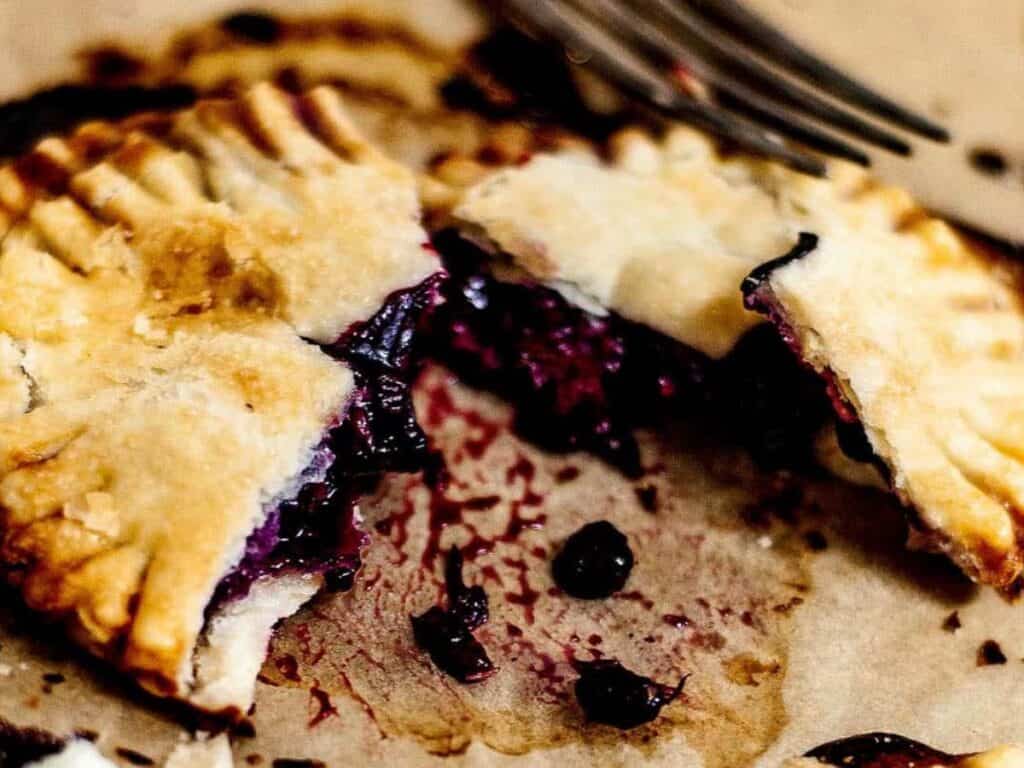 Image shows triple berry hand pies recipe.
