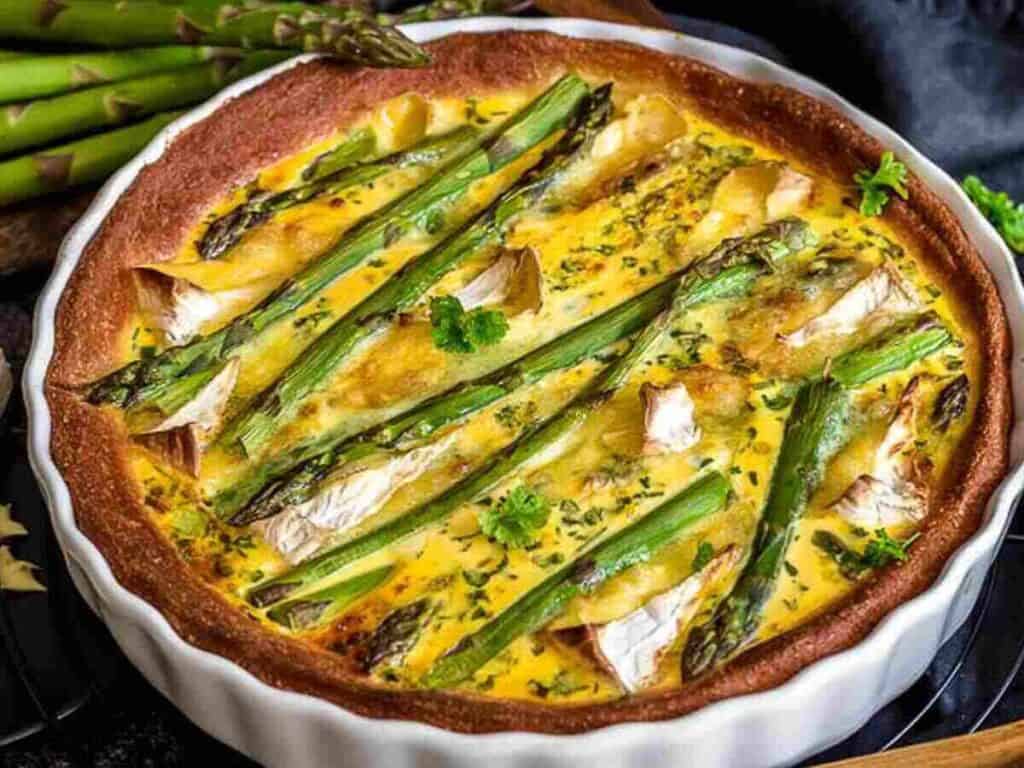 Image shows yummy asparagus fathead quiche.