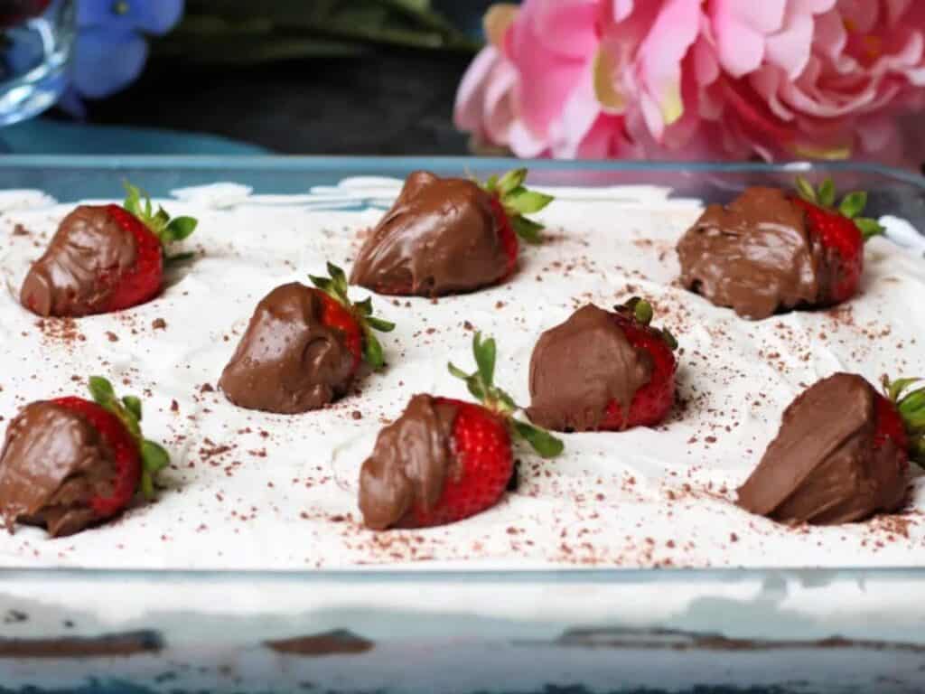 Image shows yummy chocolate covered strawberry dessert.