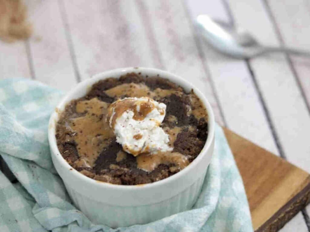 Image shows yummy salted chocolate mug cake.