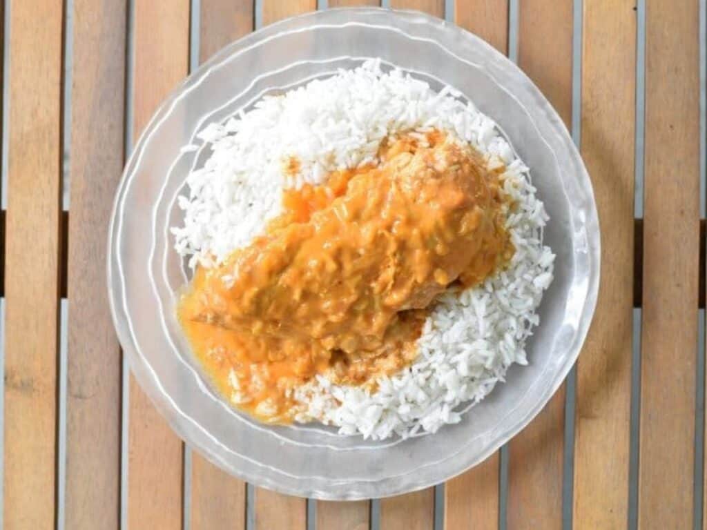 Image shows yummy chicken paprikash plated.