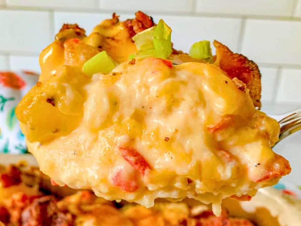 Image shows yummy loaded German potato bake.