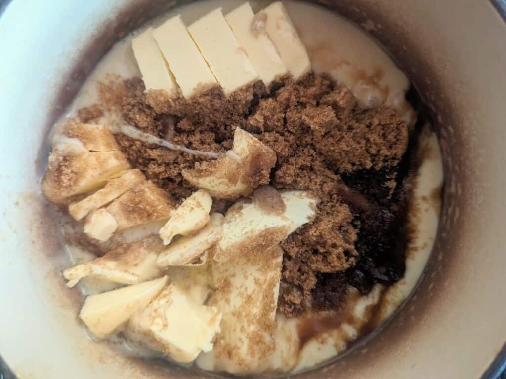 Image shows caramel filling ingredients in a saucepan, ready to be cooked.