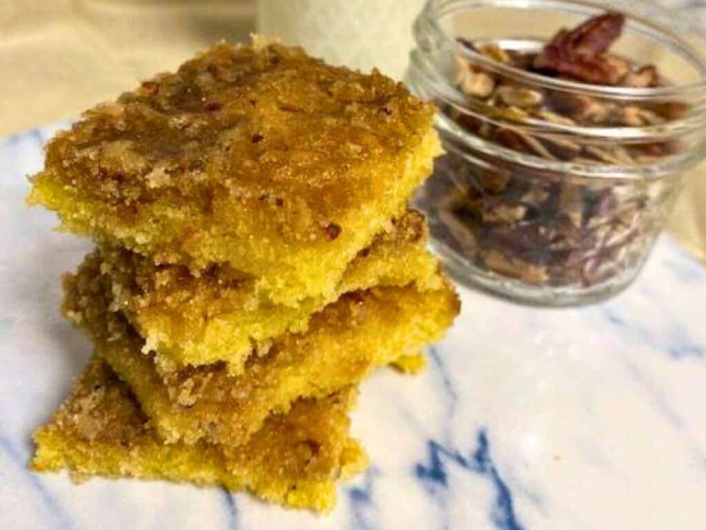 Image shows delicious old-fashioned pecan cake bars.