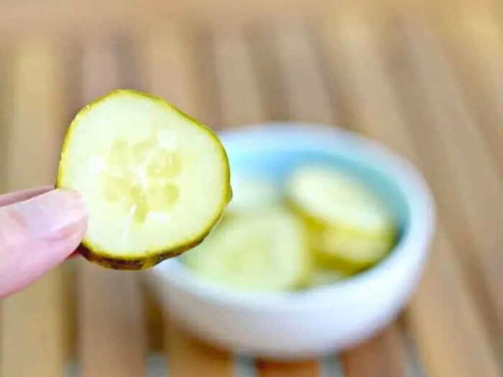 Image shows easy to make garlic dill pickles.