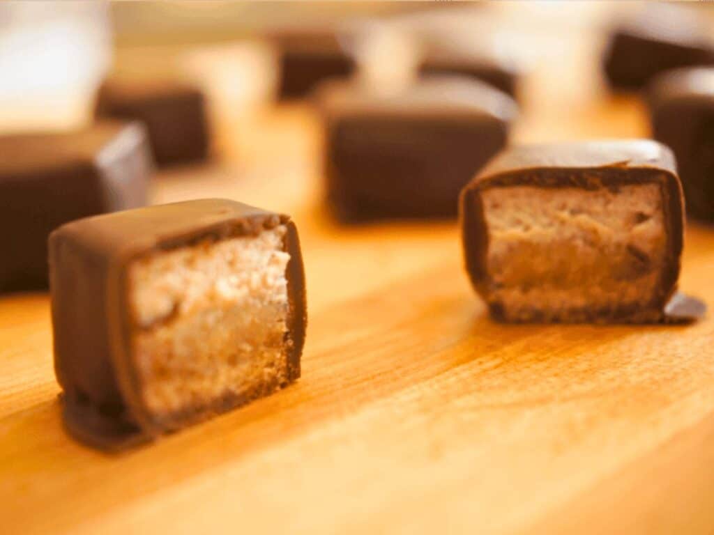 Image shows irresistible frozen cheesecake bites.