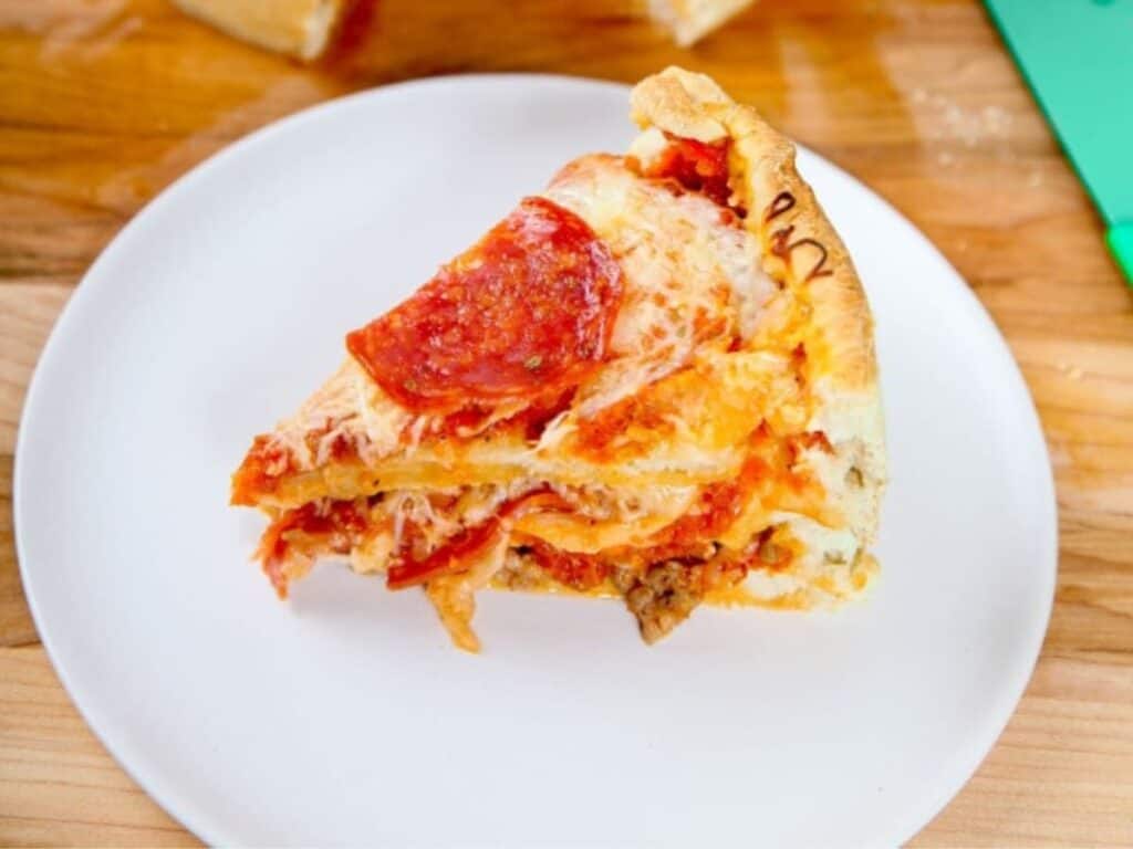 Image shows delicious pizza cake.