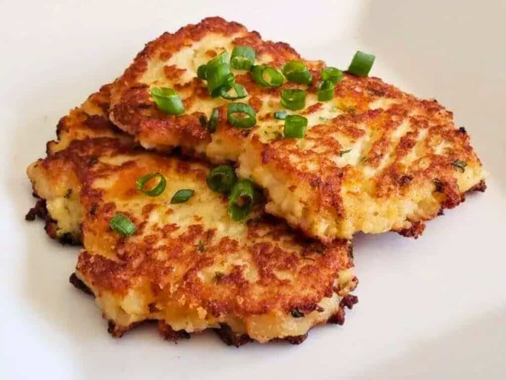 Image shows fully loaded mashed potato pancakes.