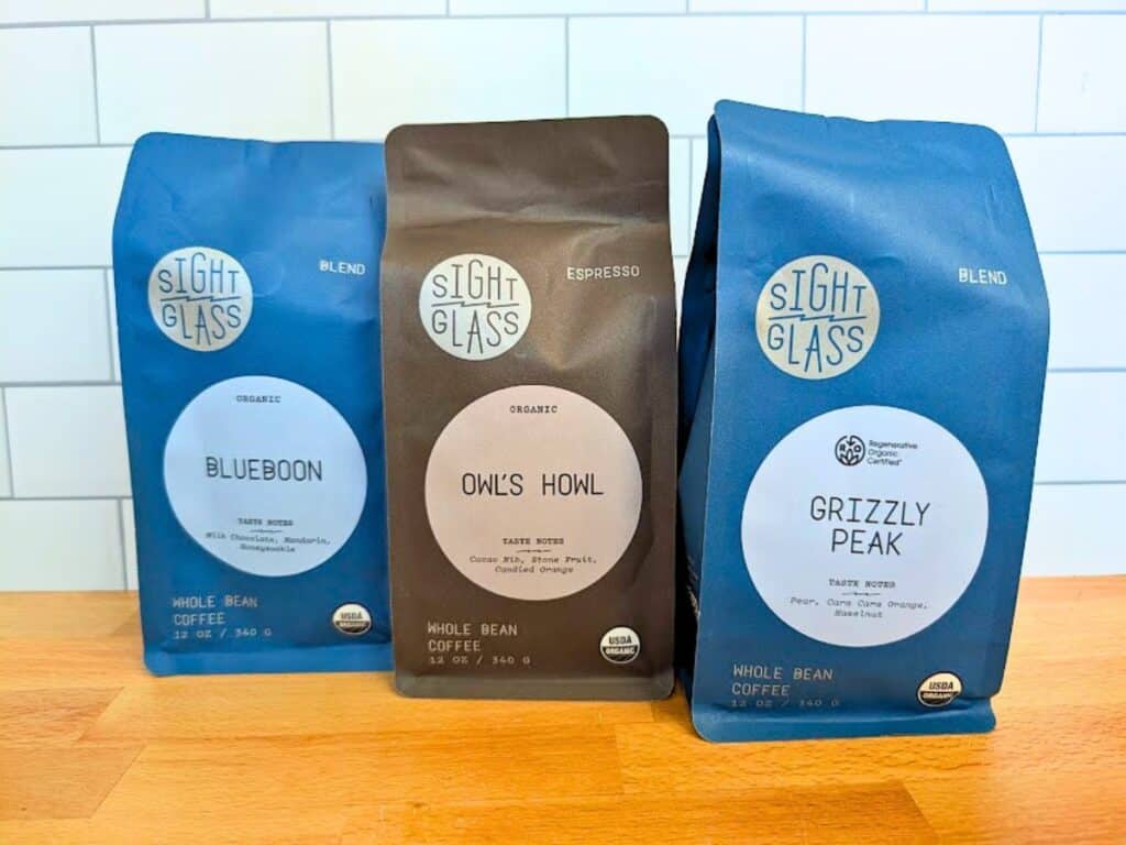 Three bags of Sightglass whole bean coffee: Blueboon, Owl&rsquo;s Howl, and Grizzly Peak.
