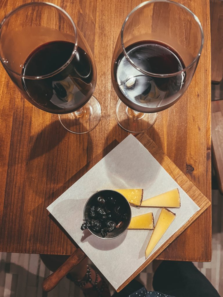 Red wines, cheese, and olives at La Charcuteria, Alicante