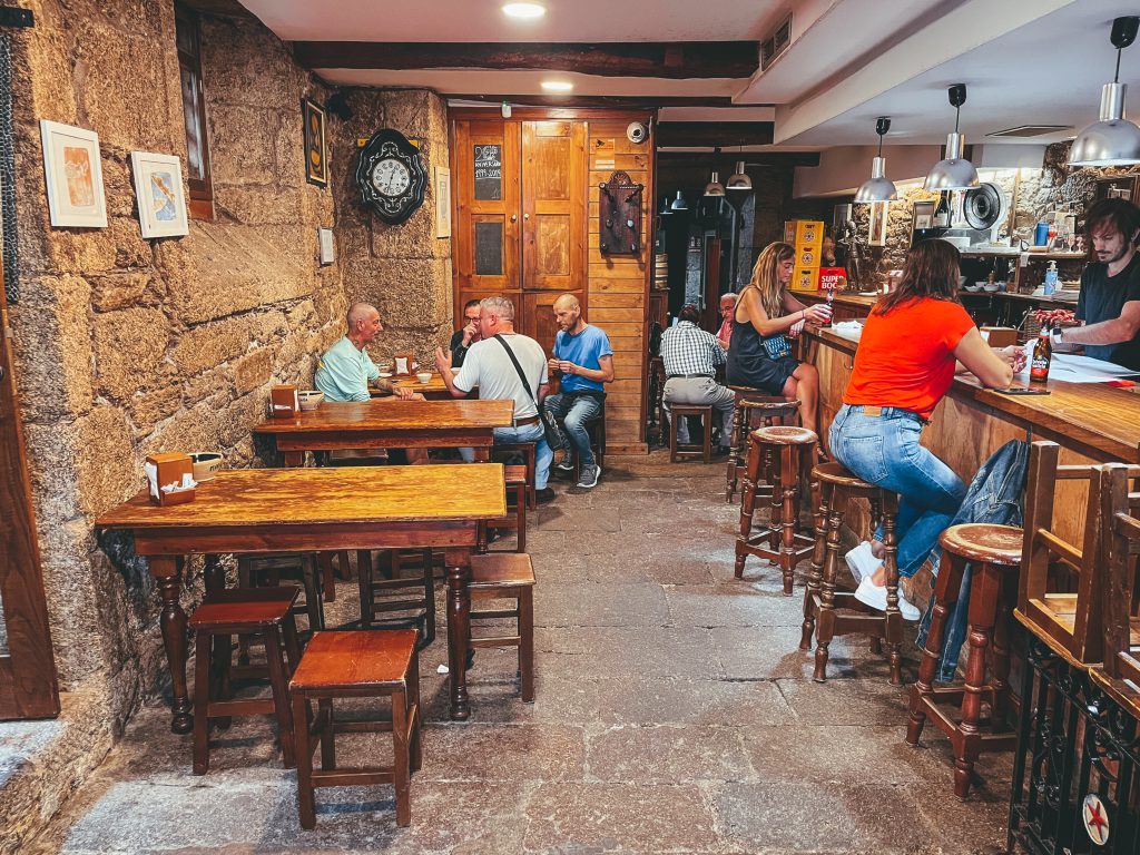 Sofia drinking at the bar inside Maria Castana