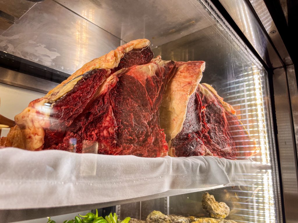A massive uncut steak on display in Santiago de Compostela