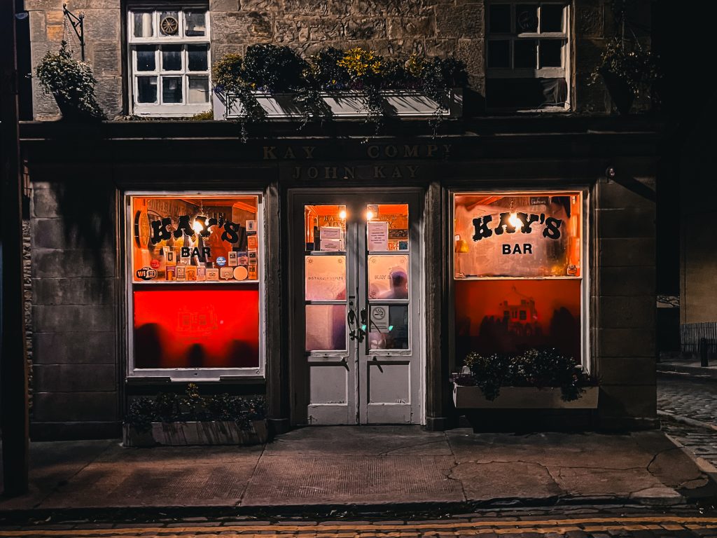 The exterior of Kays Bar in Edinburgh at night