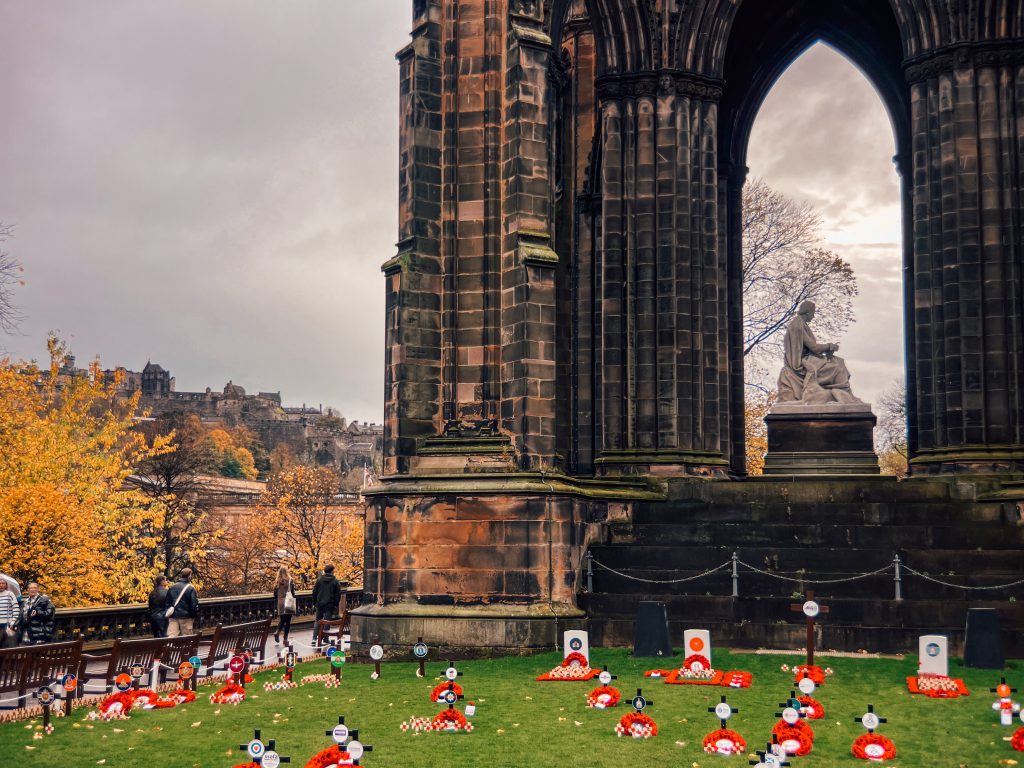 Focus on Sir Walter Scott statue at the base of the Scott Monument in Edinburgh