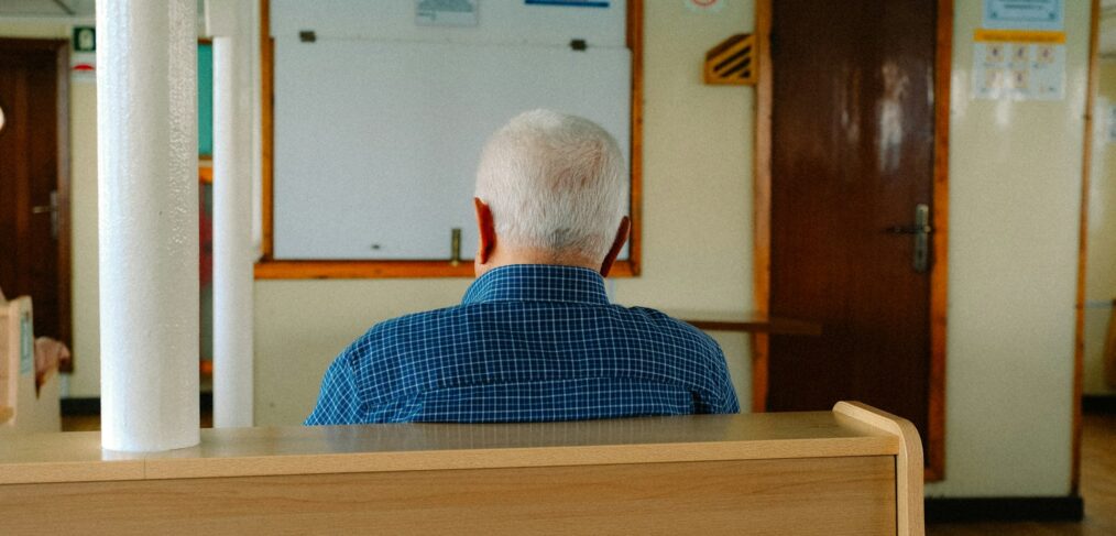 Nrusing home abuse vs neglect elderly man sits alone