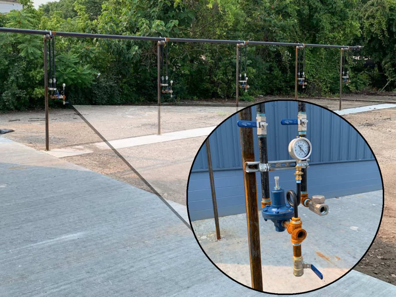 A group of pipes and valves on a construction site.
