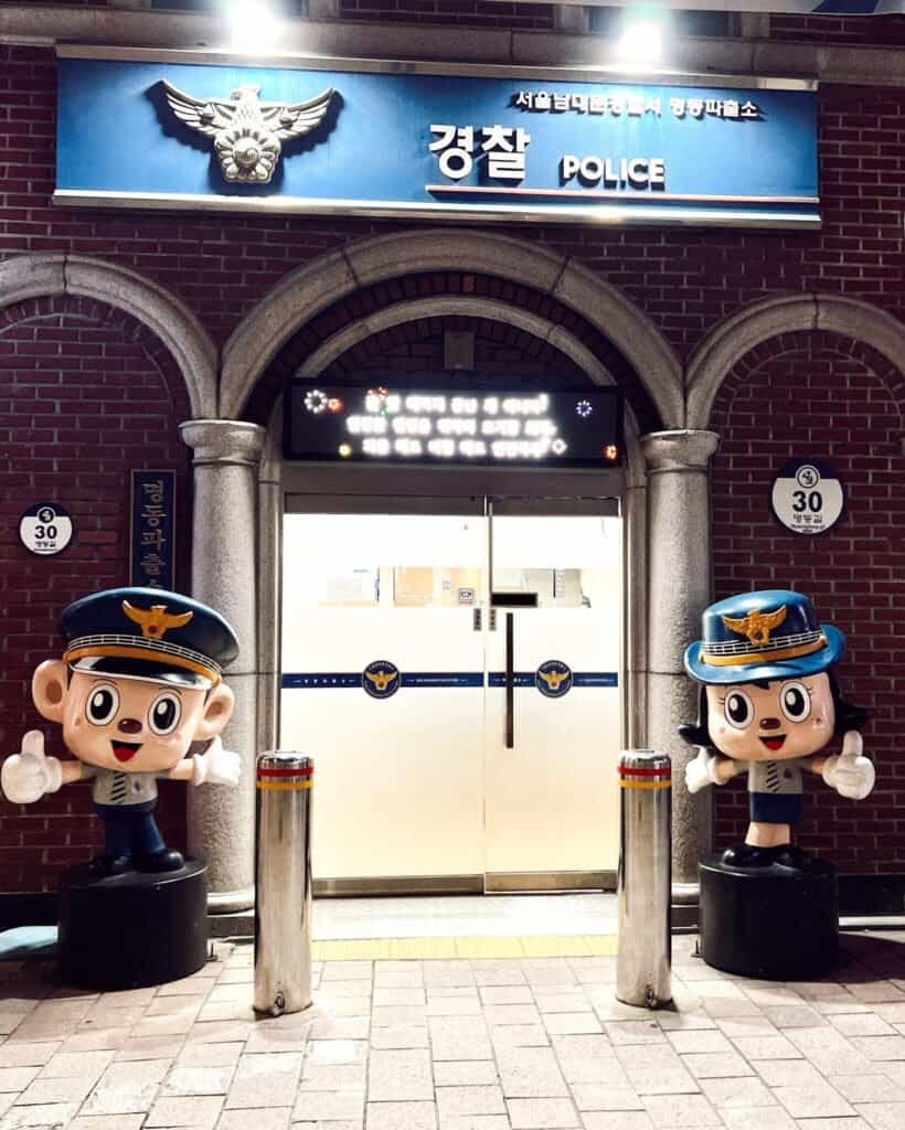 puppets in front of myeongdong police station seoul