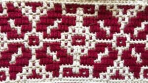 Handwoven red and white geometric rug by Juniper and Oakes.